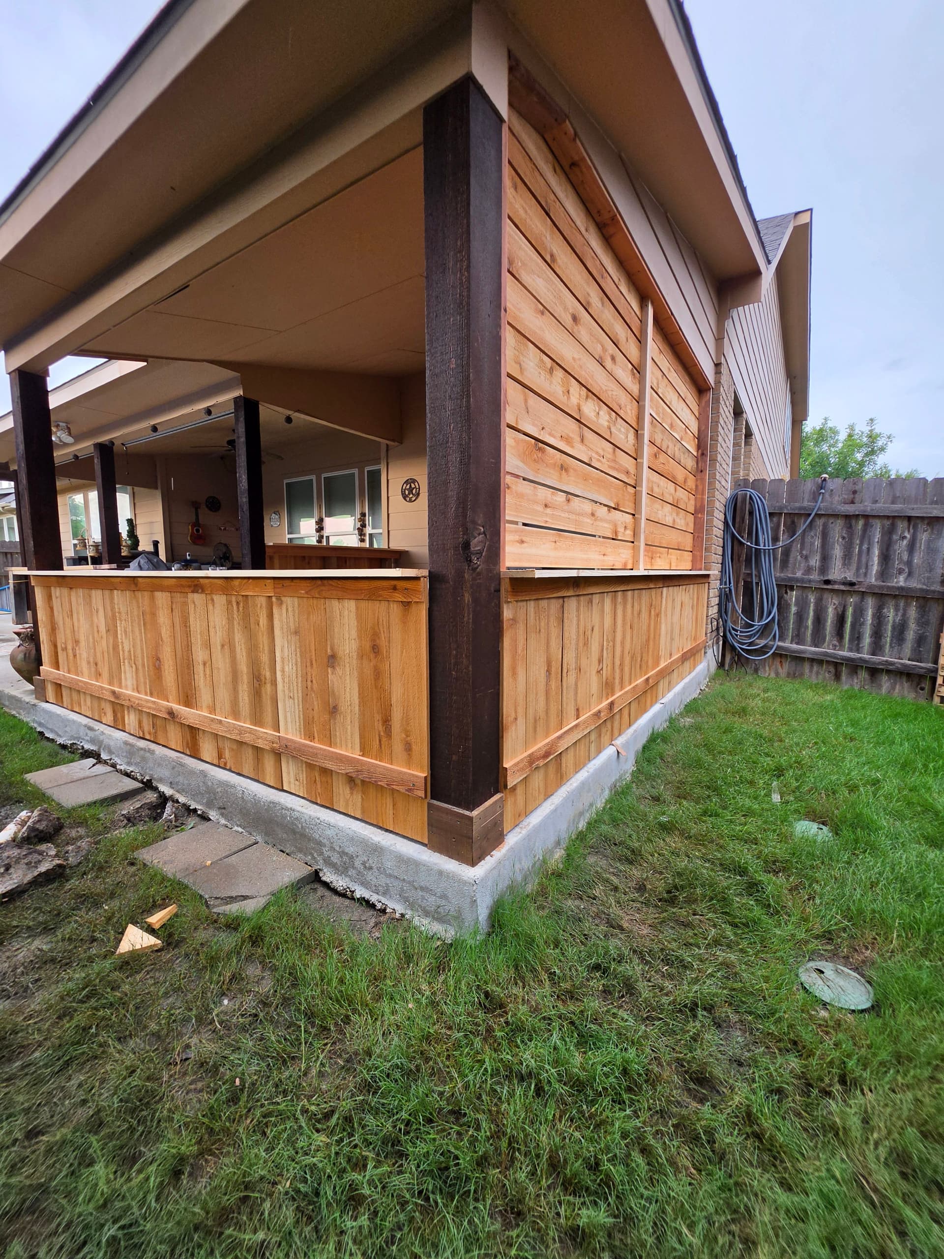 Gallery photos for Pony Wall and Accent Wall Installation Turns a Bare Patio Into an Outdoor Hangout: Image #3