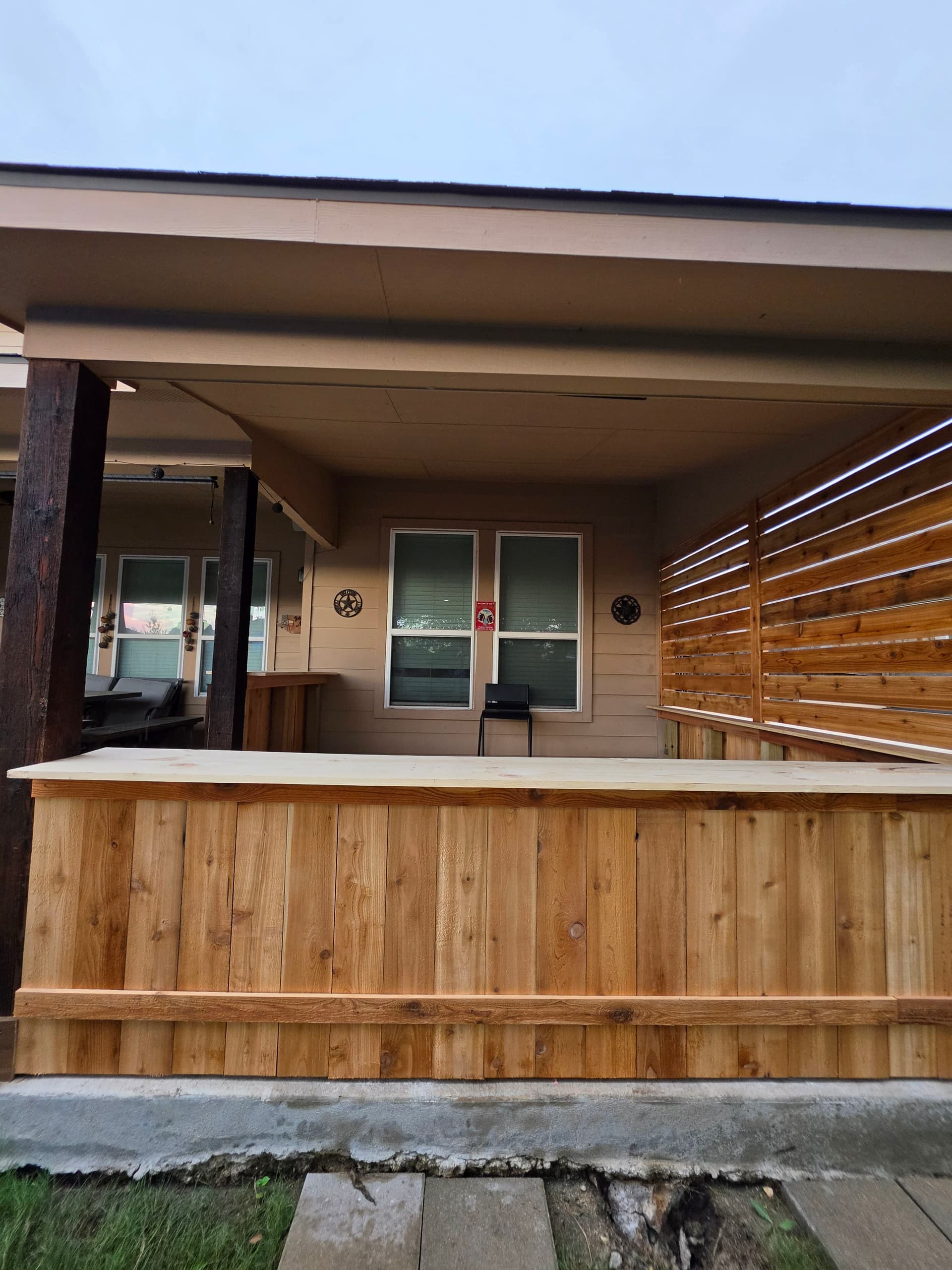 Gallery photos for Pony Wall and Accent Wall Installation Turns a Bare Patio Into an Outdoor Hangout: Image #4