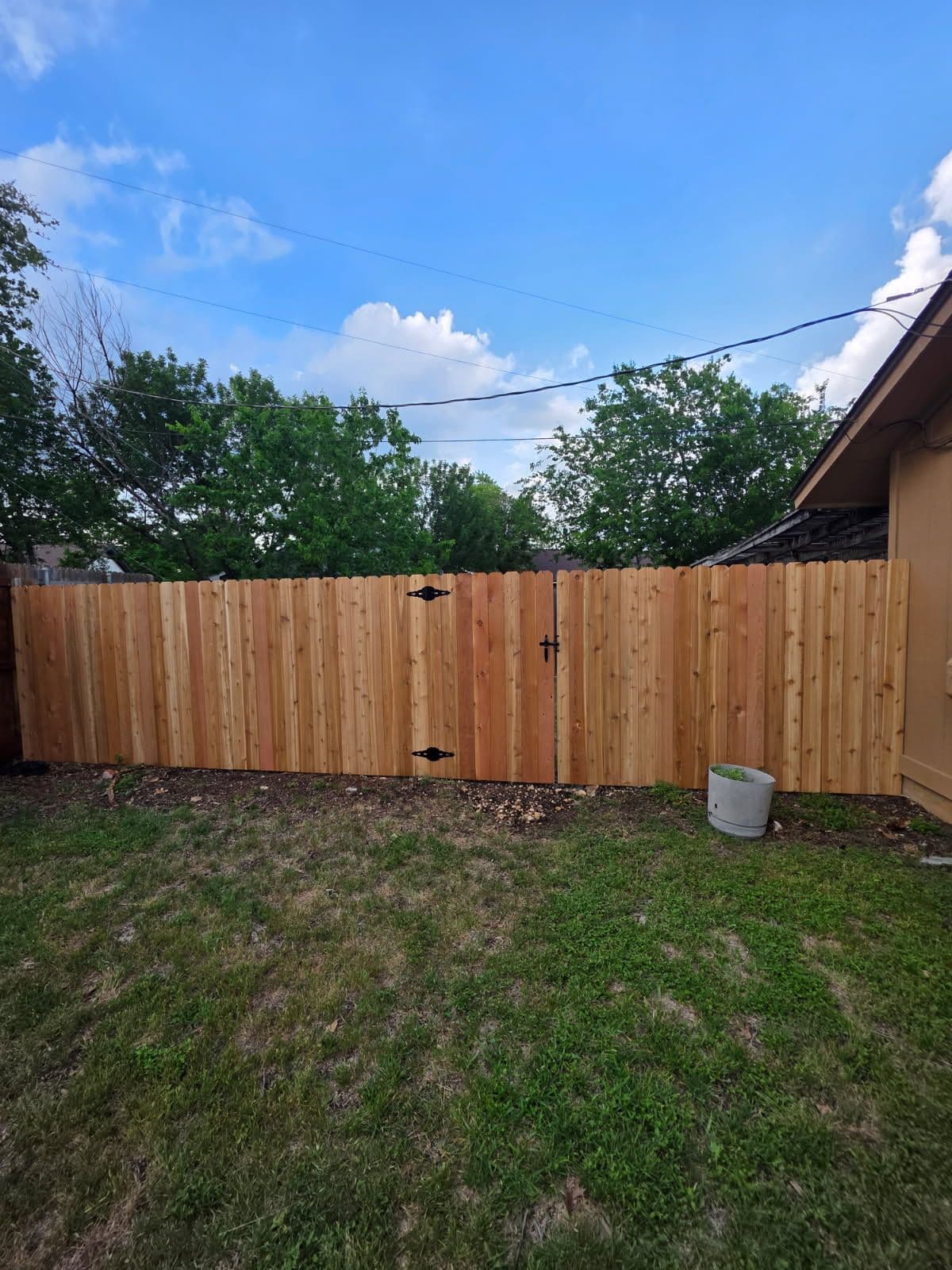 Sturdy Cedar Fence with Metal Posts